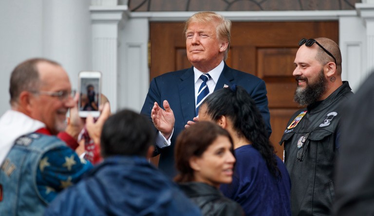 President Trump visits with members of Bikers for Trump and supporters on Aug. 11, 2018, at the clubhouse of Trump National Golf Club in Bedminster, N.J.