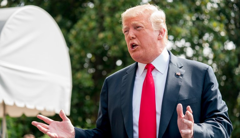 President Trump speaks to members of the media before boarding Marine One at the White House on Aug. 17, 2018.