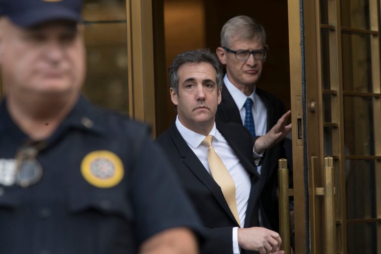 Michael Cohen, center, leaves Federal court, Tuesday, Aug. 21, 2018, in New York. Cohen, has pleaded guilty to charges including campaign finance fraud stemming from hush money payments to porn actress Stormy Daniels and ex-Playboy model Karen McDougal.