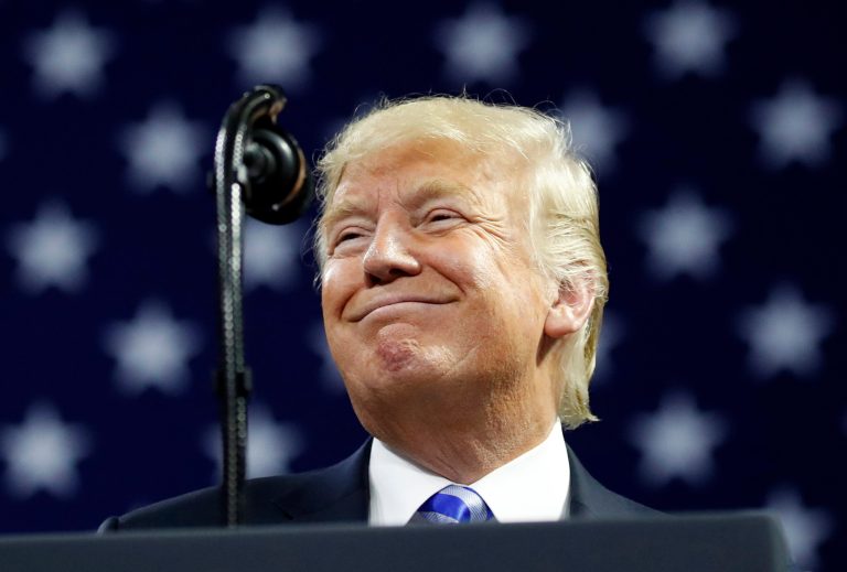 President Donald Trump pauses while speaking during a in Charleston, W.Va. this week. Supporters say they like his personality best. (AP Photo/Alex Brandon)