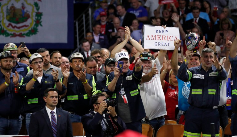 Supporters cheer after President Trump speaks during a rally. 