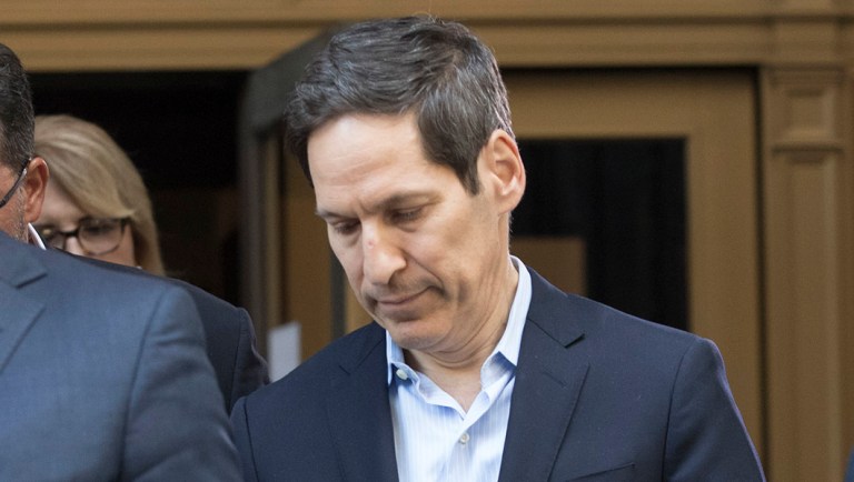 Thomas Frieden, center, leaves Brooklyn federal court, Friday, Aug. 24, 2018, in New York.