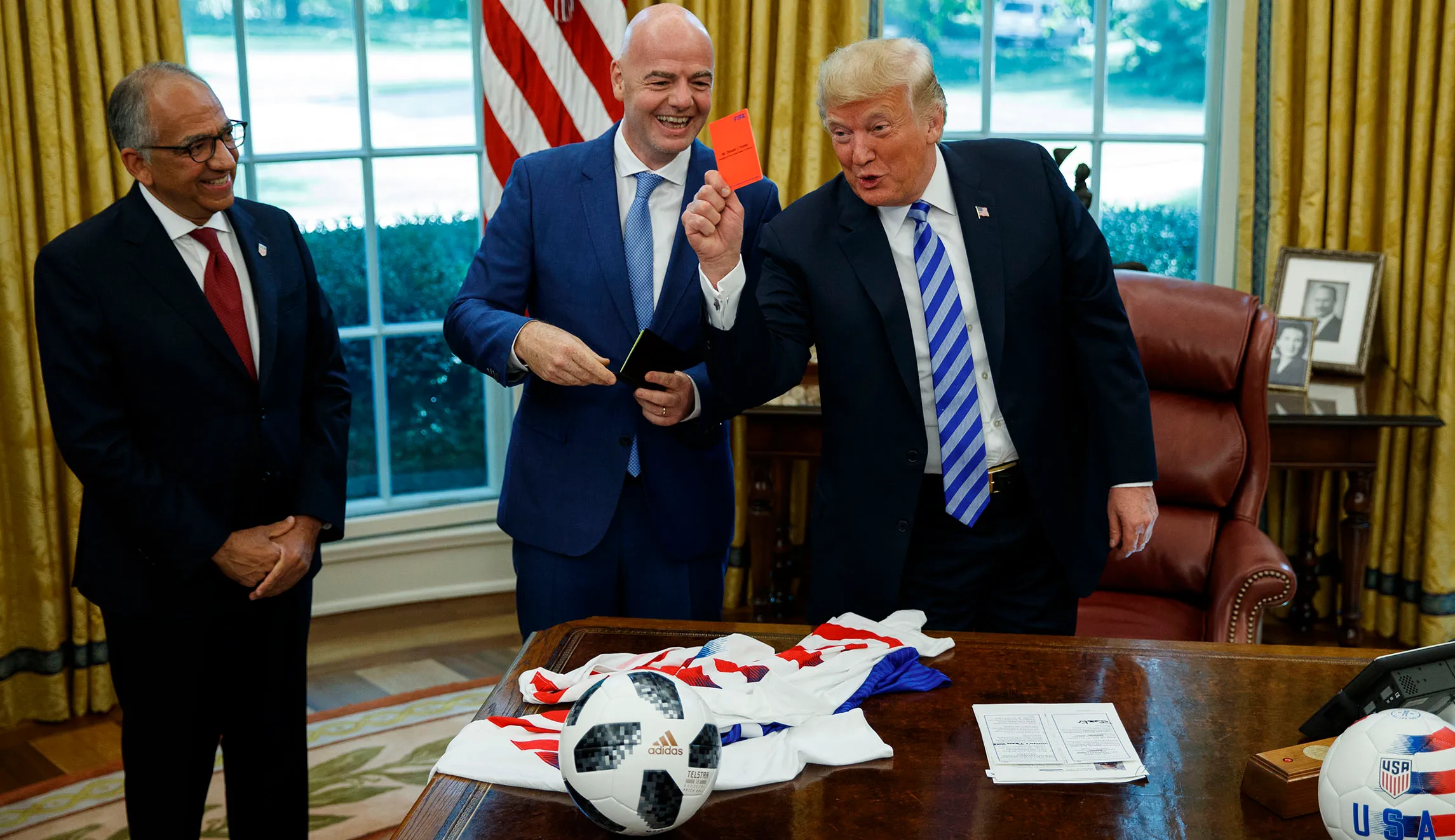 Trump jokingly gives media a soccer red penalty card