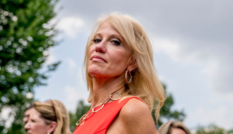 Counselor to the president Kellyanne Conway stands outside the West Wing of the White House, Wednesday, Aug. 29, 2018, in Washington. 