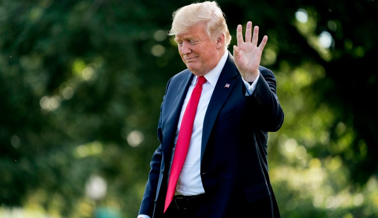 President Donald Trump waves to members of the media as he walks towards Marine One at the White House in Washington, Thursday, Aug. 30, 2018, for a short trip to Andrews Air Force Base, Md., and then on to Evansville, Ind., for a rally. 