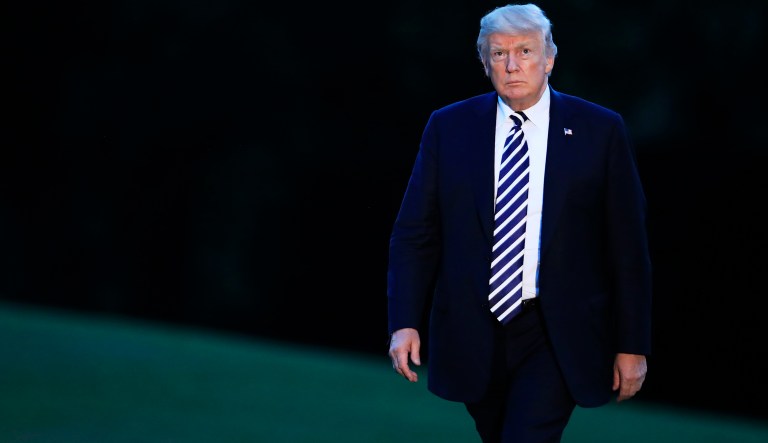 President Donald Trump arrives at the White House in Washington, Friday, Aug. 31, 2018.
