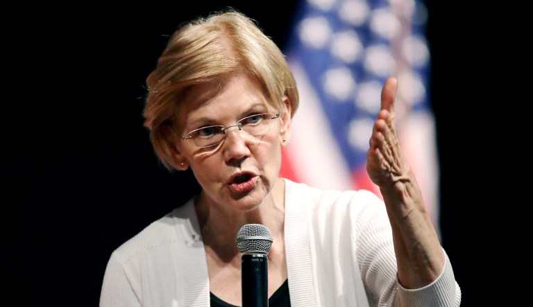 Sen. Elizabeth Warren, D-Mass., gestures during an event in Woburn, Mass.