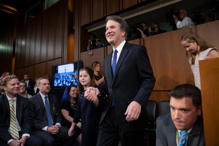 President Donald Trump's Supreme Court nominee, Brett Kavanaugh, arrives with his daughter Liza to appear before the Senate Judiciary Committee to begin his confirmation hearing to replace retired Justice Anthony Kennedy, on Capitol Hill in Washington, Tuesday, Sept. 4, 2018. Daughter Margaret is at right. 