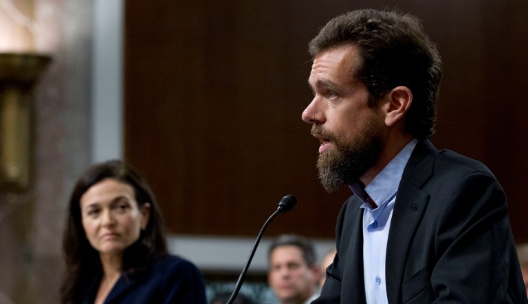 Twitter CEO Jack Dorsey, accompanied by Facebook COO Sheryl Sandberg, testify before the Senate Intelligence Committee hearing on 'Foreign Influence Operations and Their Use of Social Media Platforms' on Capitol Hill on Wednesday in D.C.