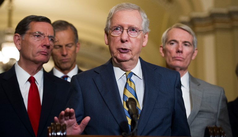 Senate Majority Leader Mitch McConnell of Kentucky, center, Sen. John Barrasso, R-Wyo., left, Sen. John Thune, R-S.D., center left, and Sen. Rob Portman, R-Ohio, speak with reporters after the Republican policy luncheon on Capitol Hill, in Washington, Wednesday, Sept. 5, 2018.
