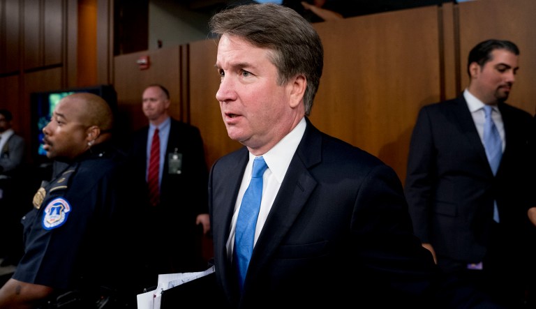 President Donald Trump's Supreme Court nominee, Brett Kavanaugh, a federal appeals court judge, second from left, returns from a short break while testifying before the Senate Judiciary Committee on Capitol Hill in Washington, Wednesday, Sept. 5, 2018, for the second day of his confirmation to replace retired Justice Anthony Kennedy.