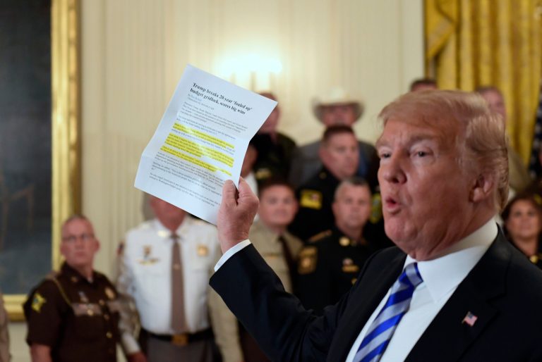 President Donald Trump responds to a reporters question during an event with sheriffs in the East Room of the White House in Washington, Wednesday, Sept. 5, 2018.