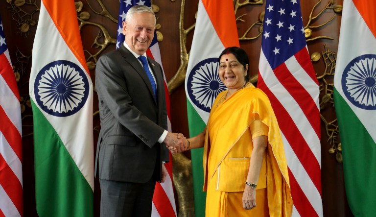 Defense Secretary Jim Mattis shakes hand with Indian Foreign Minister Sushma Swaraj before a meeting in New Delhi, India, Sept. 6, 2018.