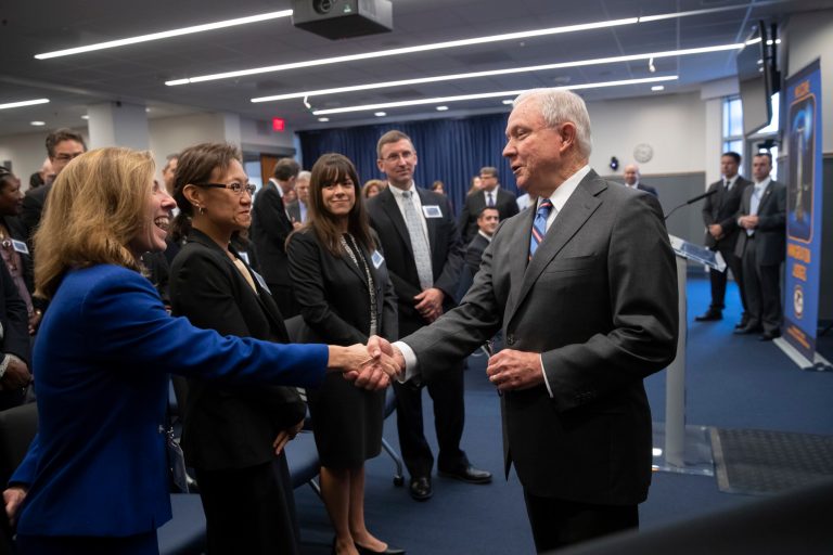 Attorney General Jeff Sessions greets new immigration judges after discussing Trump administration policies, in Falls Church, Va., Monday, Sept. 10, 2018. Immigration judges work for the Justice Department and are not part of the Judicial branch of government. 
