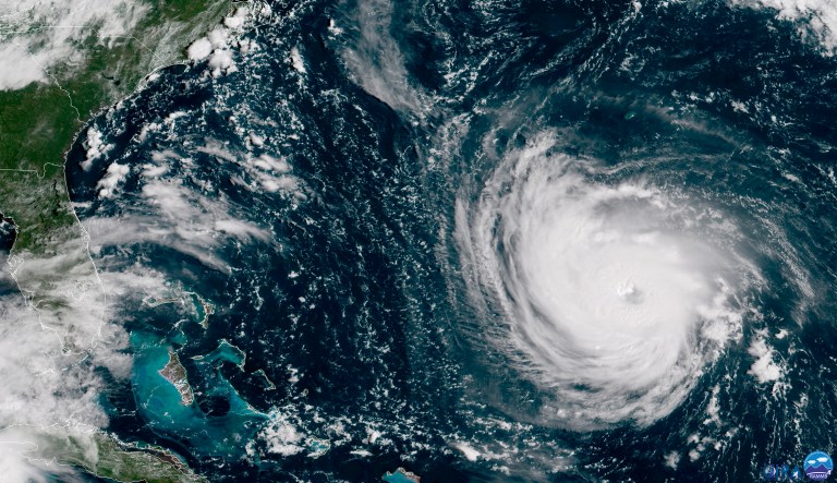 This GOES East satellite image taken Tuesday, Sept. 11, 2018, at 10:30 a.m. EDT, and provided by NOAA shows Hurricane Florence in the Atlantic Ocean as it threatens the U.S. East Coast, including Florida, Georgia, South and North Carolina. Millions of Americans are preparing for what could be one of the most catastrophic hurricanes to hit the Eastern Seaboard in decades. Mandatory evacuations begin at noon Tuesday, for parts of the Carolinas and Virginia 