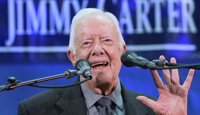 Former President Jimmy Carter, 93, answers questions during an event.