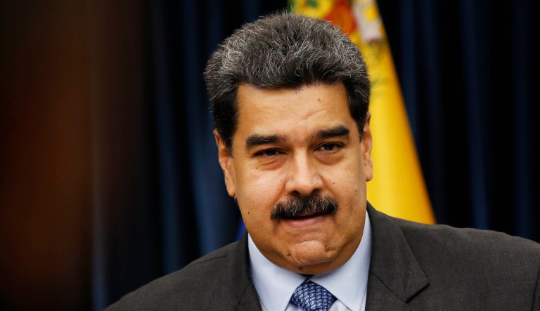 Nicolas Maduro of Venezuela stands up after a press conference. 