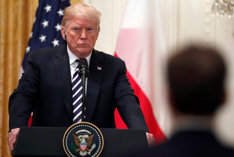 President Donald Trump listens to a reporter's question during a news conference with Polish President Andrzej Duda, in the East Room of the White House, Tuesday, Sept. 18, 2018, in Washington. 
