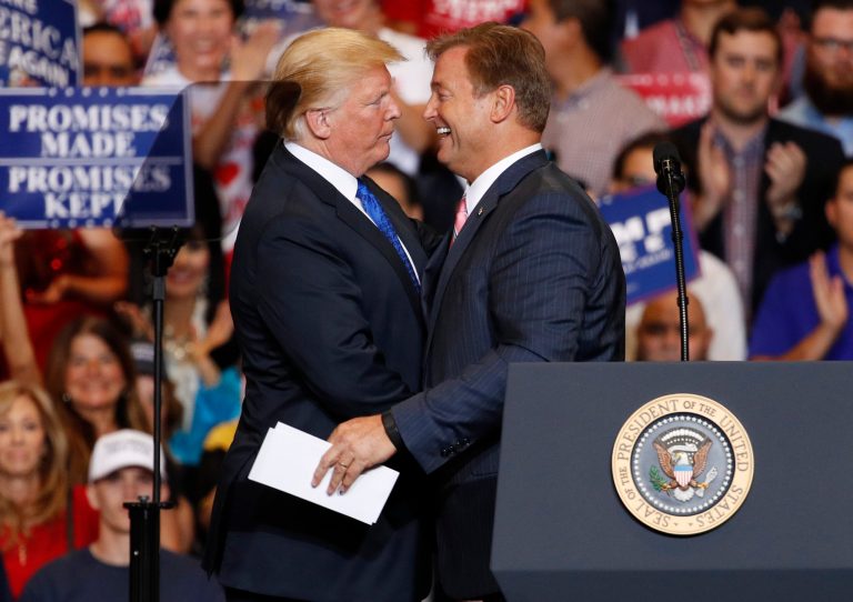 President Donald Trump, left, embraces Sen. Dean Heller, R-Nev., during a campaign rally Thursday, Sept. 20, 2018, in Las Vegas. The president hopes to build on GOP enthusiasm going into the fall midterm congressional elections.