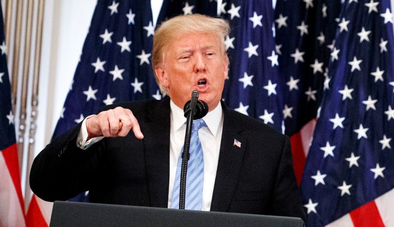 President Trump speaks during a news conference.