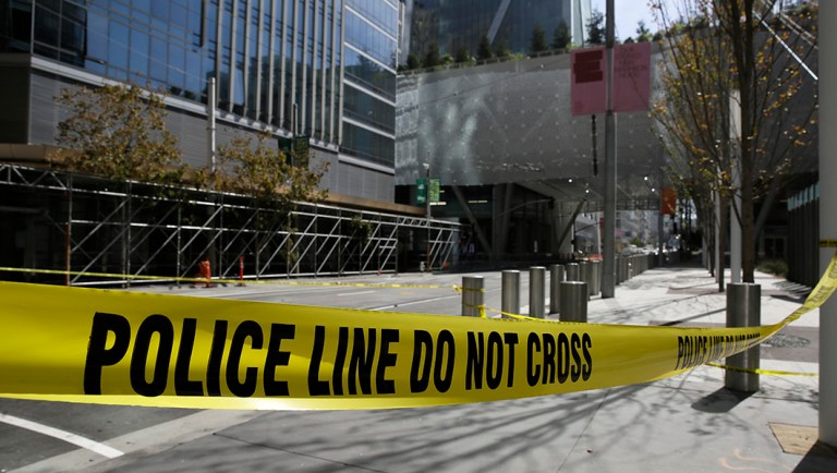 Police tape blocks off Fremont Street outside the closed Salesforce Transit Center.