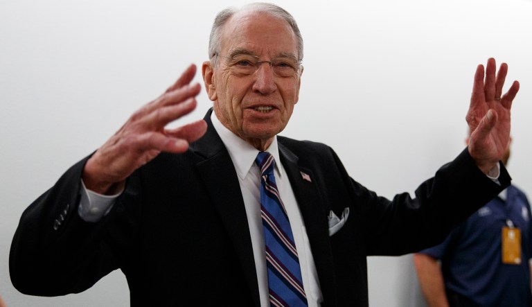 Senate Judiciary Committee chairman Chuck Grassley, R-Iowa, pauses to speak to reporters as he arrives for the Senate Judiciary hearing on Capitol Hill in Washington, Thursday, Sept. 27, 2018, with Christine Blasey Ford and Supreme Court nominee Brett Kavanaugh.
