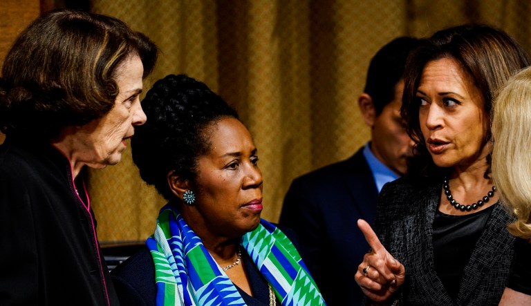 Sen. Dianne Feinstein, D-Calif., Rep. Sheila Jackson Lee, D-Texas, and Sen. Kamala Harris, D-Calif., confer before a Senate Judiciary Committee hearing on Thursday, Sept. 27, 2018, on Capitol Hill.