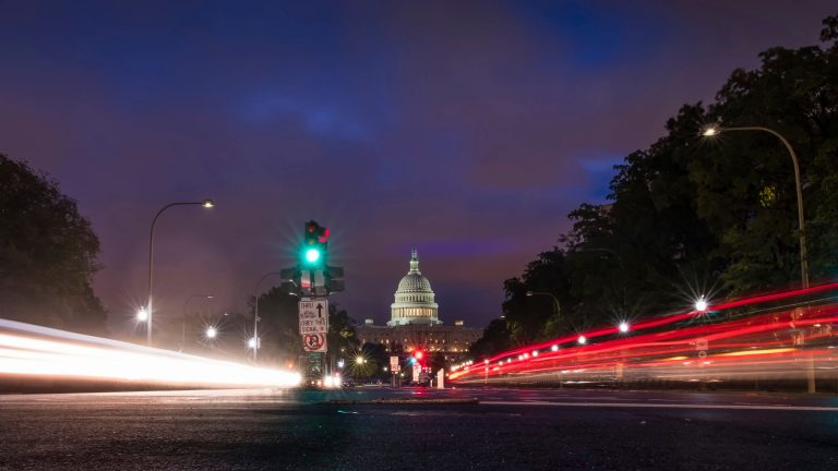 Traffic streaks to and from the U.S. Capitol along Pennsylvania Avenue early in the morning Friday, Sept. 28, 2018 in Washington.