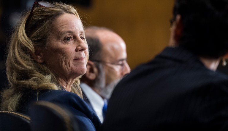 UNITED STATES - SEPTEMBER 27: Christine Blasey Ford, center, flanked by attorneys Debra Katz and Michael Bromwich, testifies during the Senate Judiciary Committee hearing on the nomination of Brett M. Kavanaugh to be an associate justice of the Supreme Court of the United States, focusing on allegations of sexual assault by Kavanaugh against Christine Blasey Ford in the early 1980s.