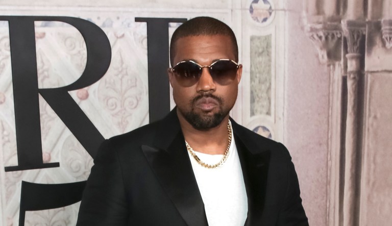 FILE- In this Sept. 7, 2018, file photo Kanye West attends the Ralph Lauren 50th Anniversary Event held at Bethesda Terrace in Central Park during New York Fashion Week in New York. President Donald Trump has panned Saturday Night Live's season premiere but tweeted praise for Kanye West. As the show ended, West took the stage wearing a "Make America Great Again" hat and made an unscripted pro-Trump speech after the credits rolled.