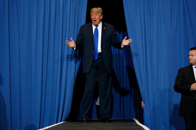 President Donald Trump arrives to speak at a campaign rally at the Landers Center Arena, Tuesday, Oct. 2, 2018, in Southaven, Miss.