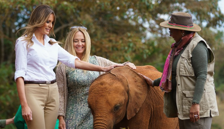 First lady Melania Trump, with Margaret Kenyatta, Kenya's first lady, pets a baby elephant at the David Sheldrick Elephant & Rhino Orphanage at Nairobi National Park in Nairobi, Kenya.