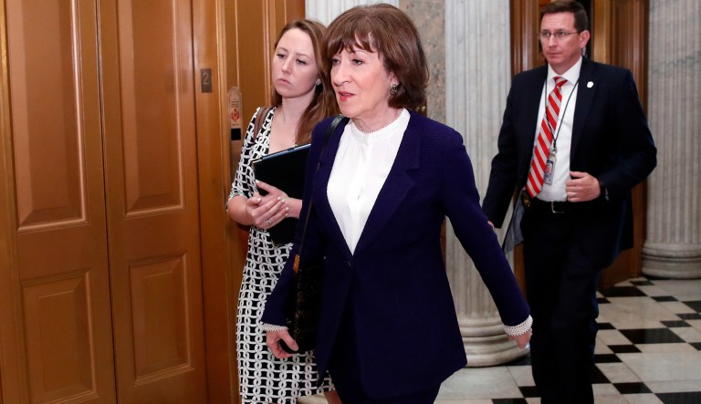 Sen. Susan Collins, R-Maine, heads to the Senate floor for the vote on the confirmation vote of Supreme Court nominee Brett Kavanaugh, on Capitol Hill, Saturday, Oct. 6, 2018 in Washington.