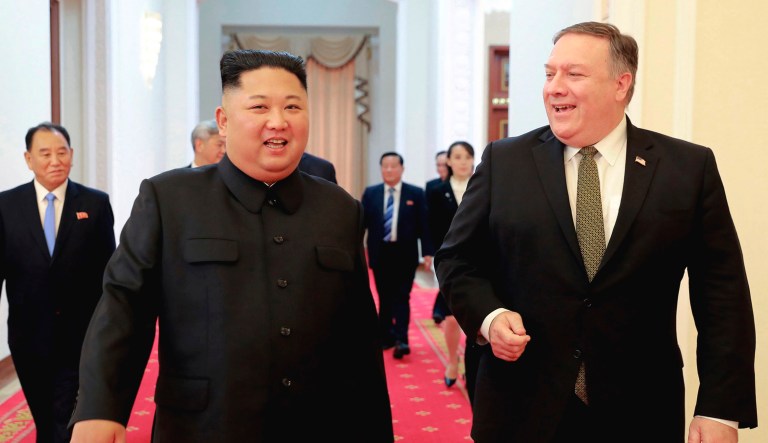 North Korean leader Kim Jong Un (center-left) and U.S. Secretary of State Mike Pompeo walk together before their meeting in Pyongyang, North Korea, on Sunday.