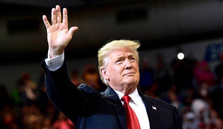 President Trump arrives to speak at a rally.