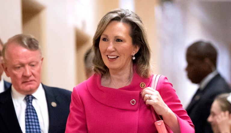 Rep. Barbara Comstock, R-Va., walks to a closed-door meeting at the Capitol in Washington.