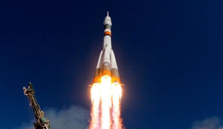 The Soyuz-FG rocket booster with Soyuz MS-10 space ship carrying a new crew to the International Space Station blasts off at the Russian-leased Baikonur cosmodrome in Kazakhstan on Thursday.