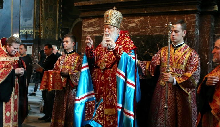 Patriarch Filaret, head of the Ukrainian Orthodox Church of the Kiev Patriarchate, conducts a service at the Volodymysky Cathedral in Kiev, Ukraine, on Thursday. The Istanbul-based Ecumenical Patriarchate says it will move forward with its decision to grant Ukrainian clerics independence from the Russian Orthodox Church. 