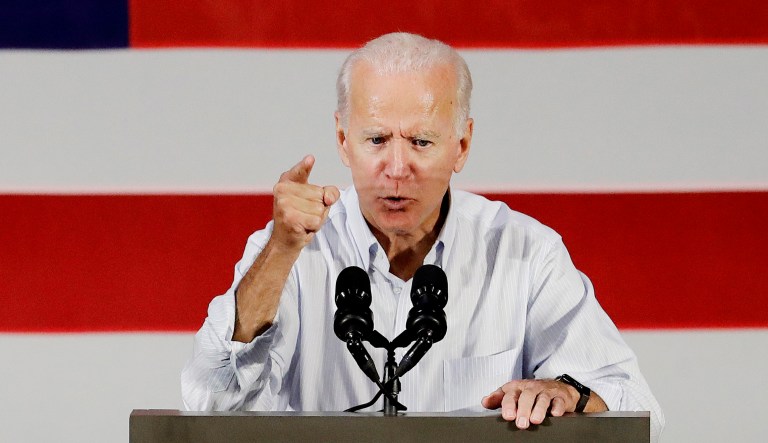Former Vice President Joe Biden, right, speaks during a rally.