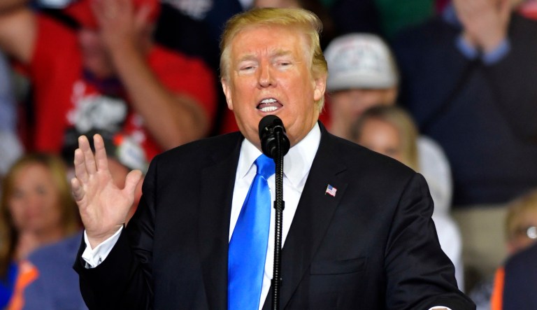 President Donald Trump speaks to a crowd at Eastern Kentucky University, Saturday, Oct. 13, 2018, in Richmond, Ky.