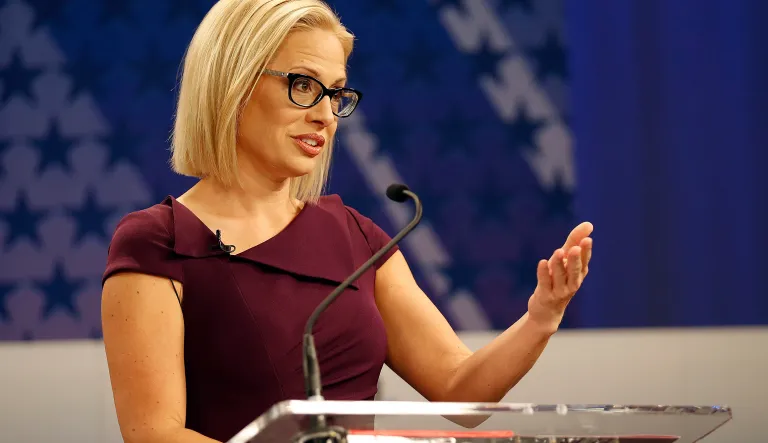 Rep. Kyrsten Sinema, D-Ariz., goes over the rules in a television studio prior to a televised debate with Rep. Martha McSally, R-Ariz., Monday, Oct. 15, 2018, in Phoenix.