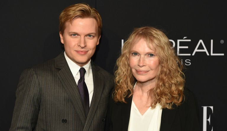 Actress Mia Farrow, right, recipient of the ELLE Legend Award, poses with her son journalist Ronan Farrow at the 25th Annual ELLE Women in Hollywood Celebration, Monday, Oct. 15, 2018, in Los Angeles.