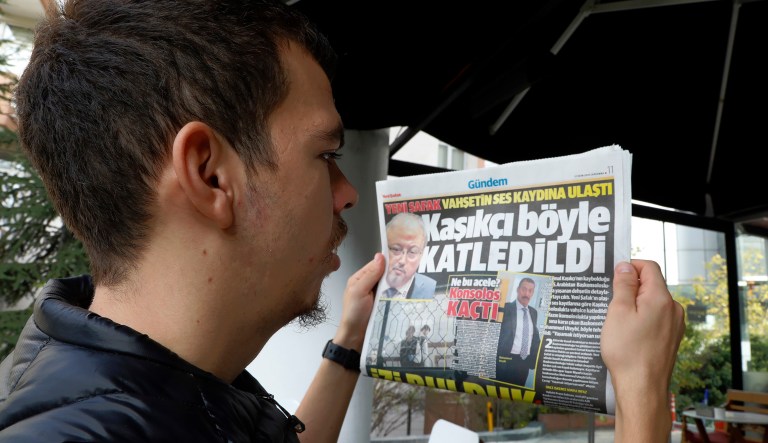 A man reads Yeni Safak newspaper in a cafe with the headline that reads  This is how Khashoggi was slaughtered " in Ankara, Turkey, Wednesday, Oct. 17, 2018. Pro-government newspaper Yeni Safak on Wednesday said it had obtained audio recordings of the alleged killing of Saudi writer Jamal Khashoggi inside the Saudi Arabia's consulate in Istanbul on Oct. 2. 
