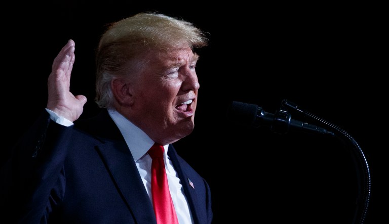 President Trump speaks at a campaign rally at International Air Response, Friday, Oct. 19, 2018, in Mesa, Ariz. 