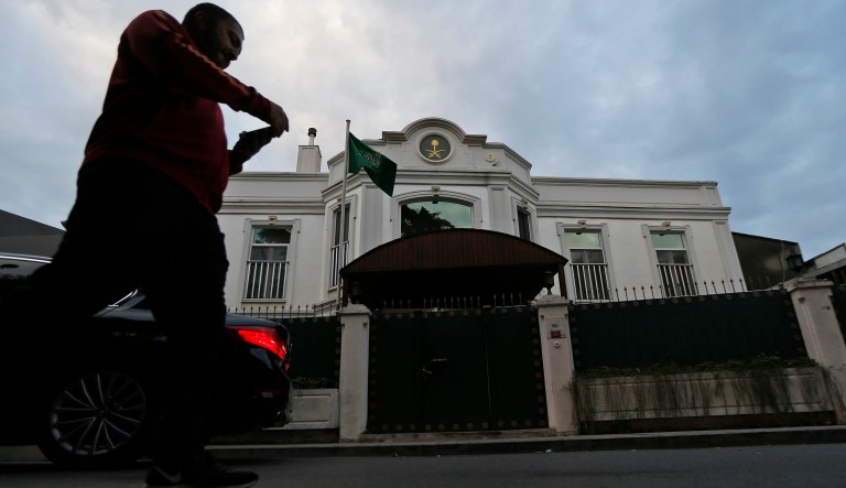 A man walks past Saudi Arabia's consul general's official residence in Istanbul, Wednesday, Oct. 24, 2018. Turkey's state-run news agency says Saudi officials did not allow Turkish investigators, probing the killing of Saudi journalist Jamal Khashoggi, to search a well in the garden of the Saudi Consulate. Turkish forensic teams have searched the Consulate, the consul general's official residence as well as vehicles belonging to the consulate as part of their probe into Khashoggi's disappearance and death.