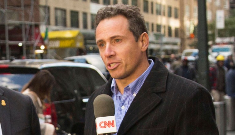 CNN correspondent Chris Cuomo speak on air in front of the Time Warner Building in New York. 