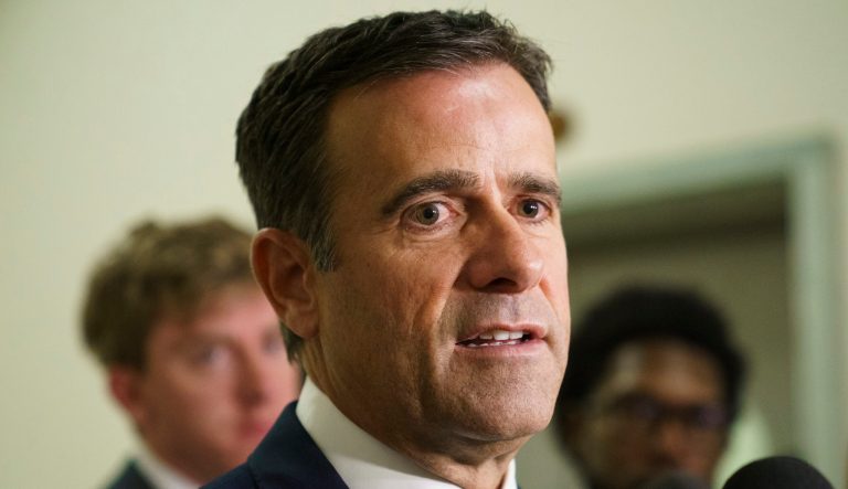 Rep. John Ratcliffe, R-Texas., pauses as he speaks to media on Capitol Hill in Washington, Thursday, Oct. 25, 2018. \