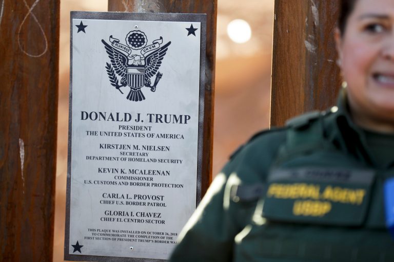 A plaque is seen along a newly fortified border wall structure Friday, Oct. 26, 2018, in Calexico, Calif.