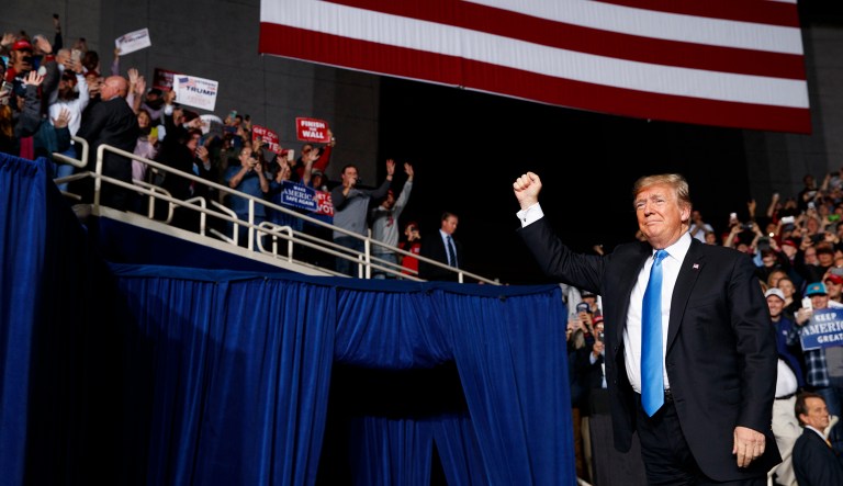 President Trump arrives arrives to speak at a campaign rally at Bojangles' Coliseum on Friday in Charlotte, N.C.