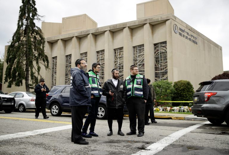 Personnel from Chesed Shel Emes Emergency Services and Recovery Unit gather near the Tree of Life Congregation in Pittsburgh, Sunday, Oct. 28, 2018. Robert Bowers, the suspect in the mass shooting at the synagogue, expressed hatred of Jews during the rampage and told officers afterward that Jews were committing genocide and he wanted them all to die, according to charging documents made public Sunday. 